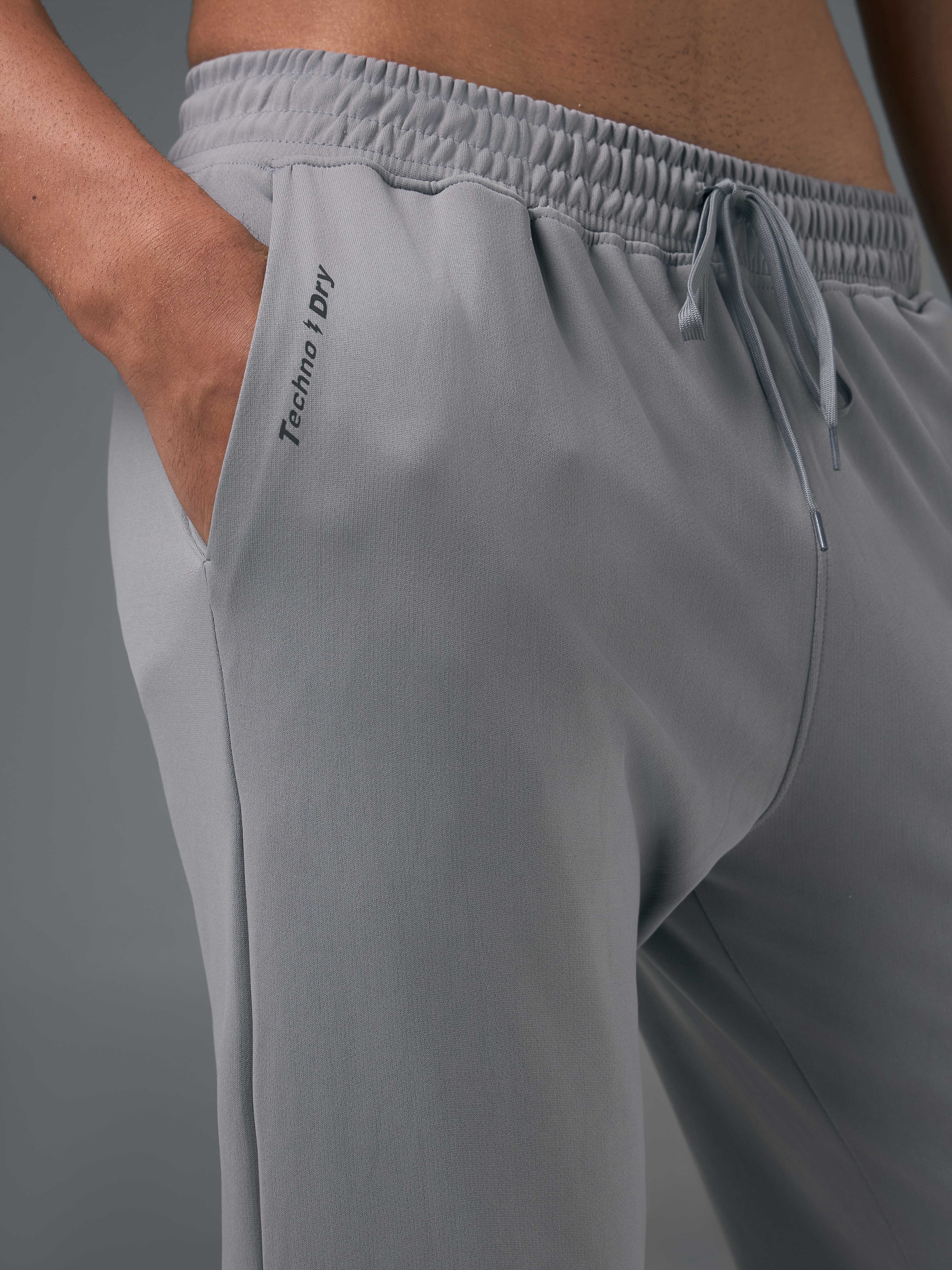 Men Melange Slim Fit Trackpants with TECHNO DRY - Image 7