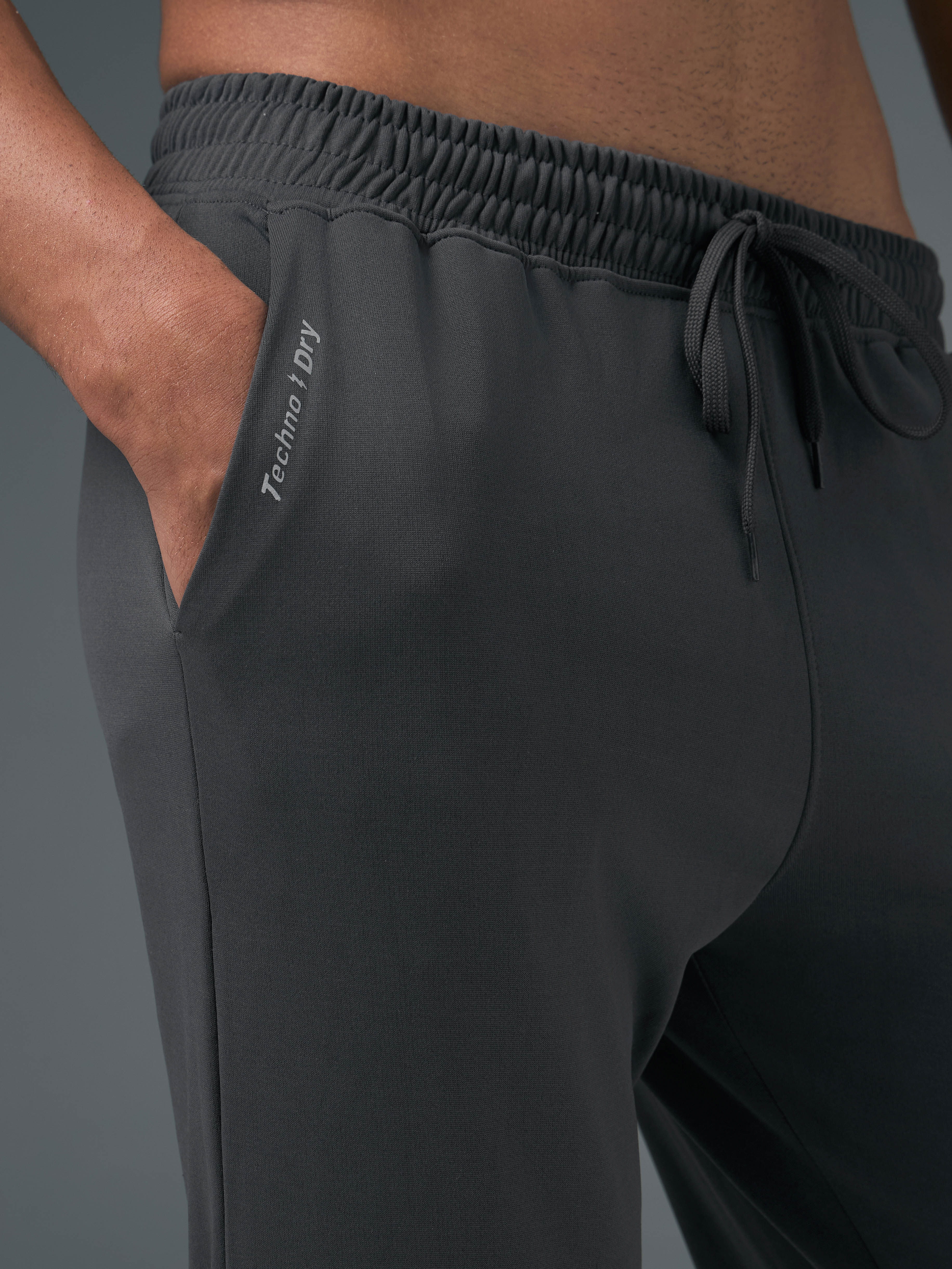 Men Melange Slim Fit Trackpants with TECHNO DRY - Image 7