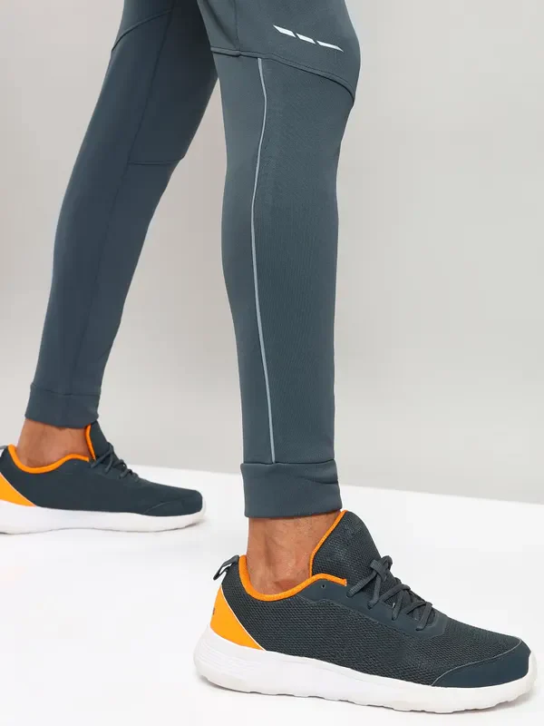 Men Solid Slim Fit Trackpants with TECHNO DRY - Image 6