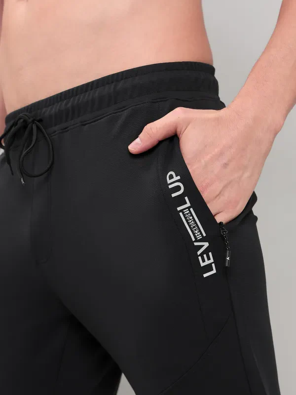 Men Solid Slim Fit Trackpants with TECHNO DRY - Image 6
