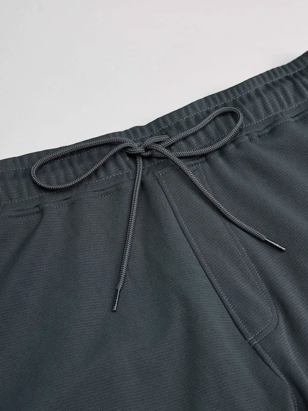 Men Solid Slim Fit Trackpants with TECHNO DRY - Image 7