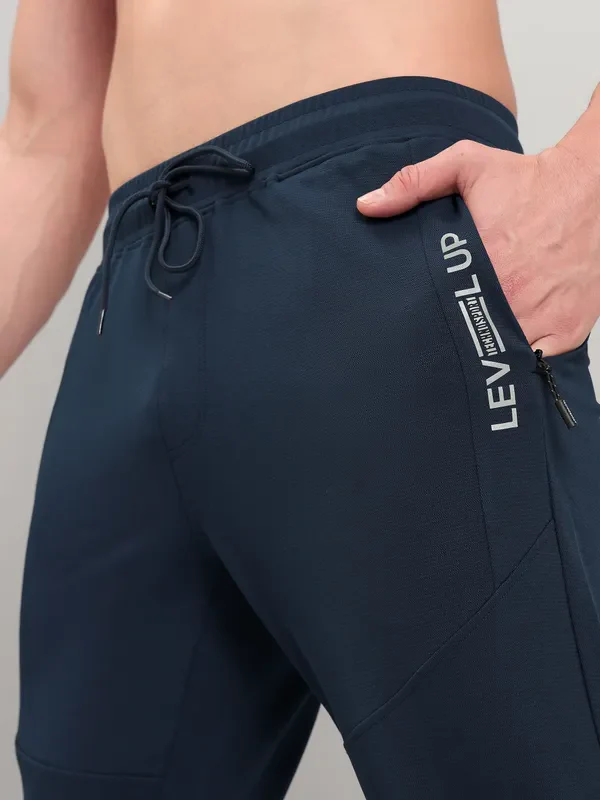 Men Solid Slim Fit Trackpants with TECHNO DRY - Image 6