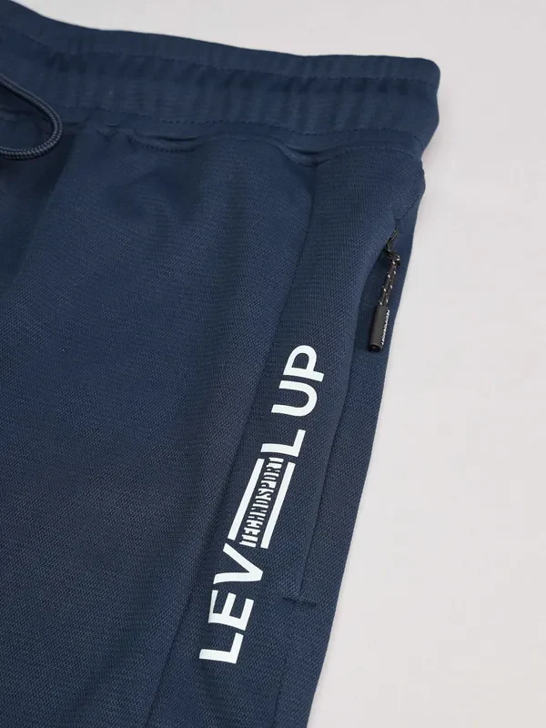 Men Solid Slim Fit Trackpants with TECHNO DRY - Image 8