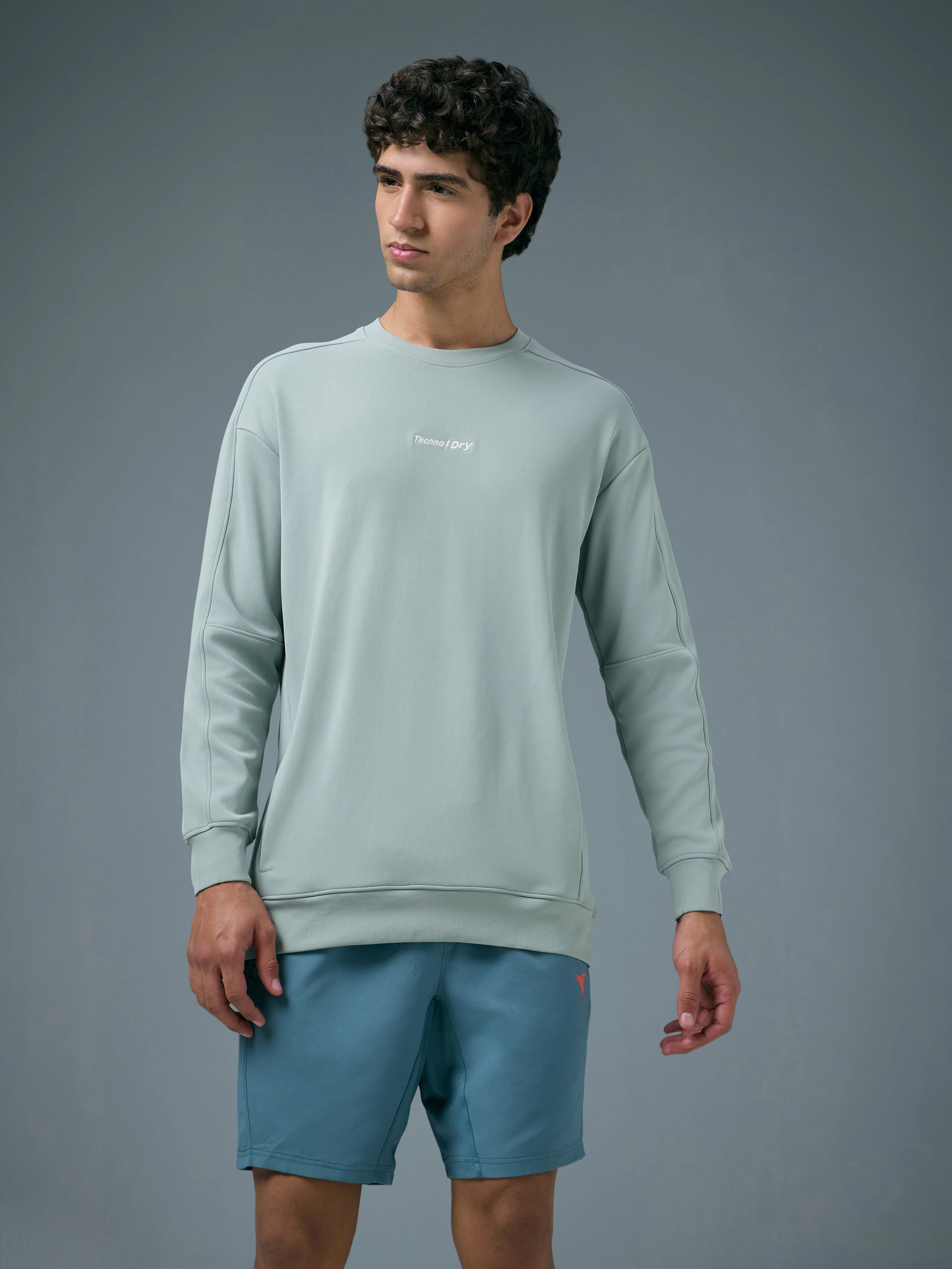 Men Solid Slim Fit Round Neck Sports Sweatshirt with ELASTOPLUS - Image 2