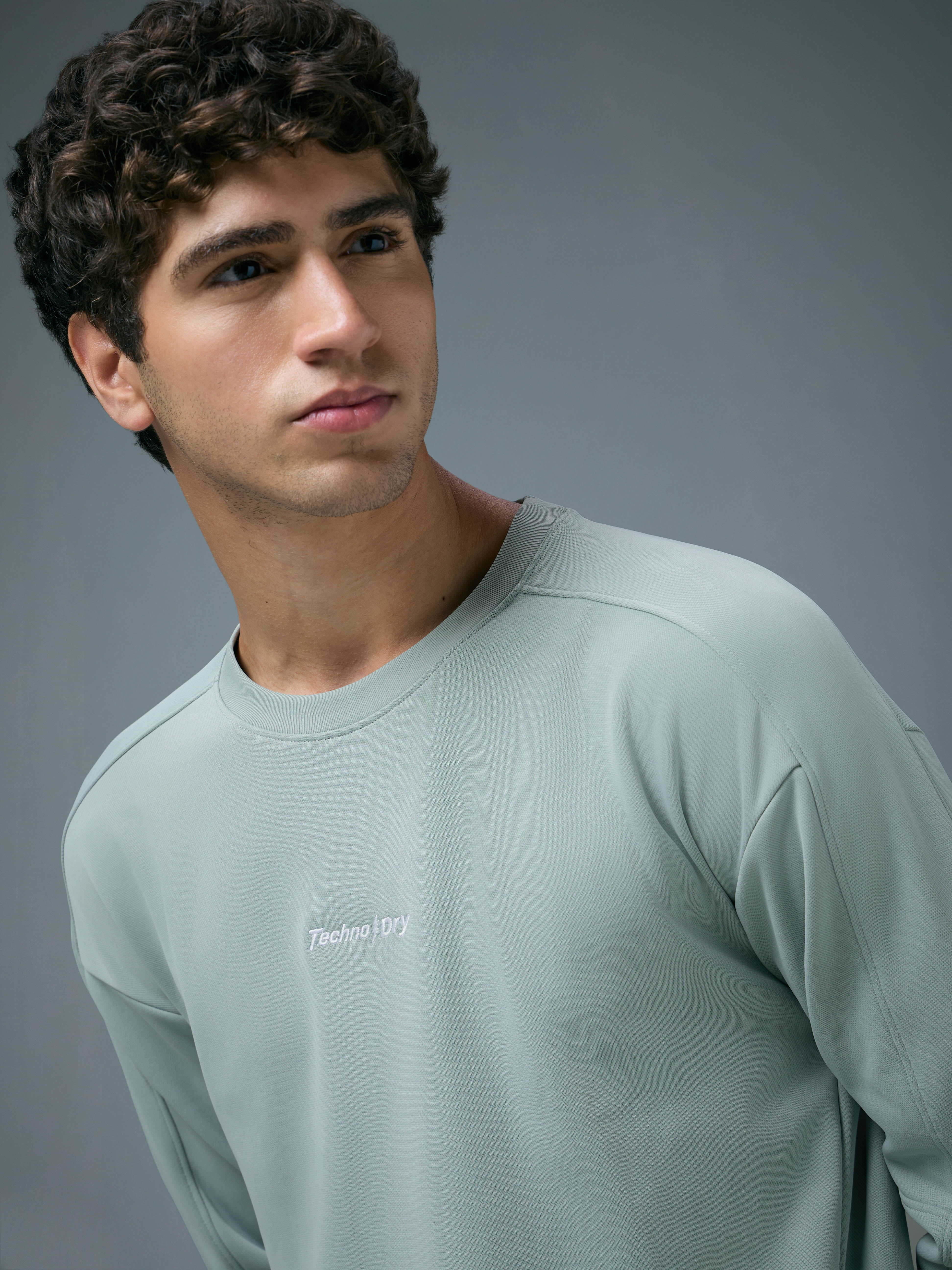 Men Solid Slim Fit Round Neck Sports Sweatshirt with ELASTOPLUS - Image 6