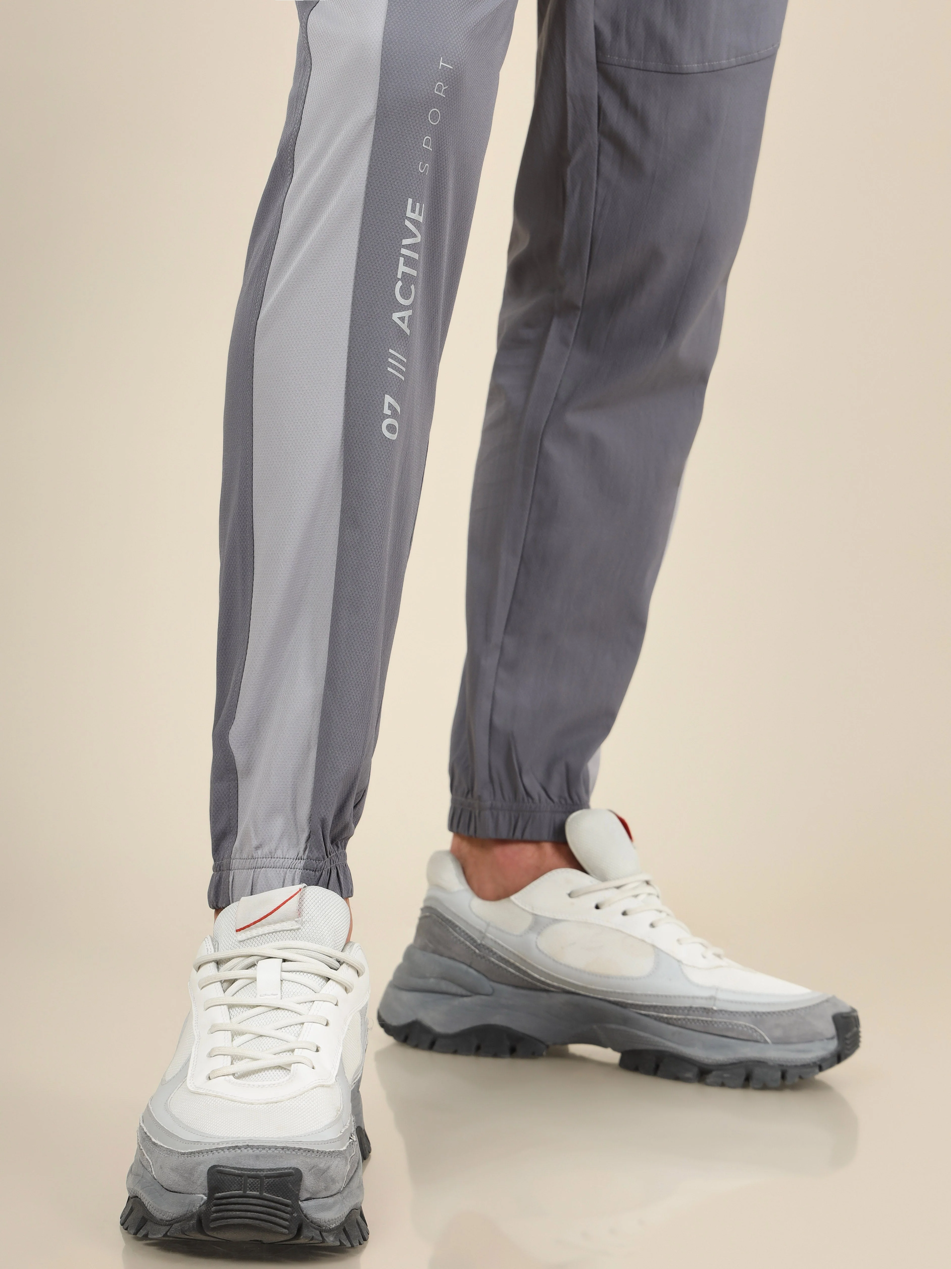 Men Solid Slim Fit Sports Joggers with TECHNOLITE - Image 8