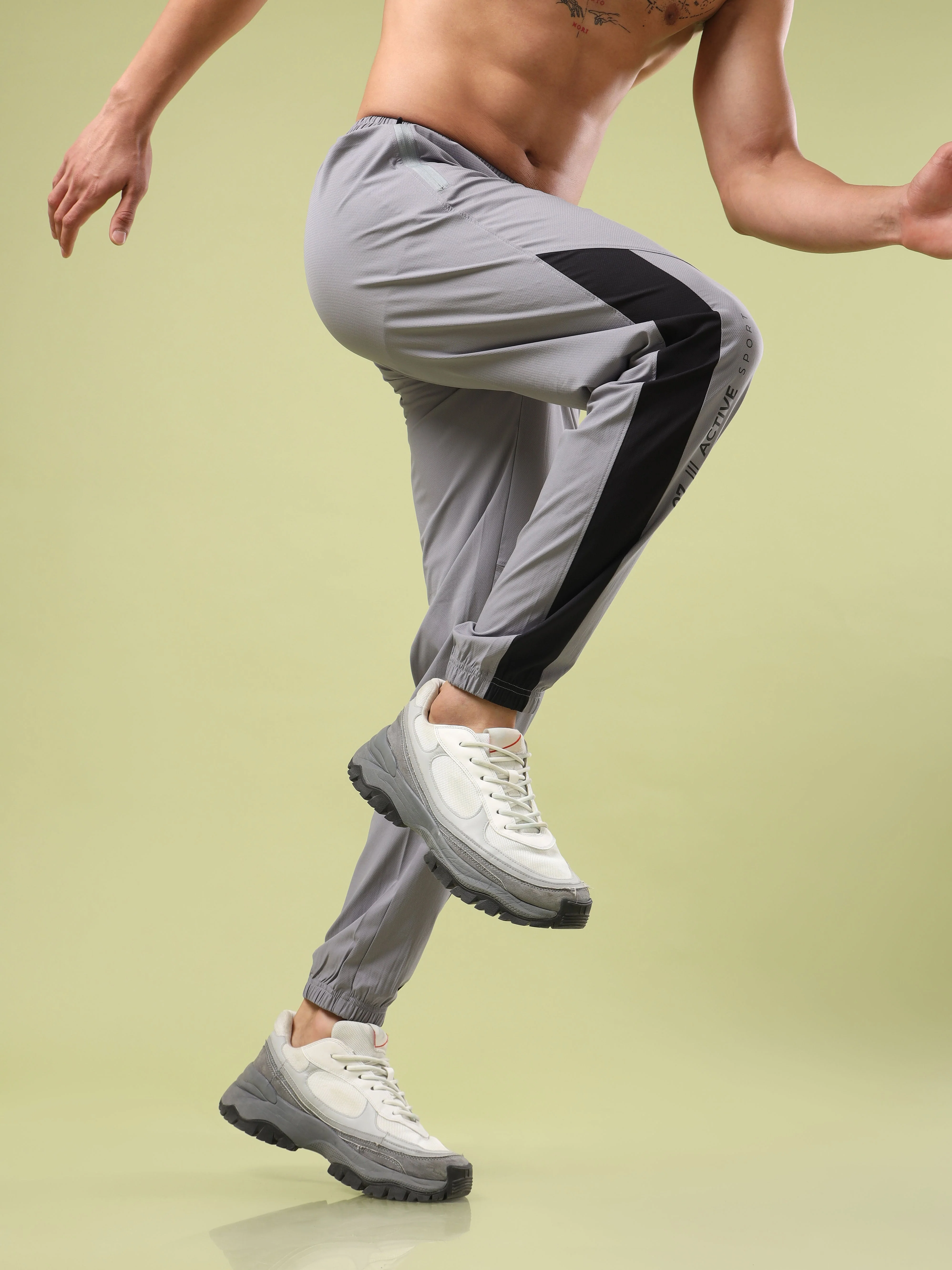 Men Solid Slim Fit Sports Joggers with TECHNOLITE - Image 2