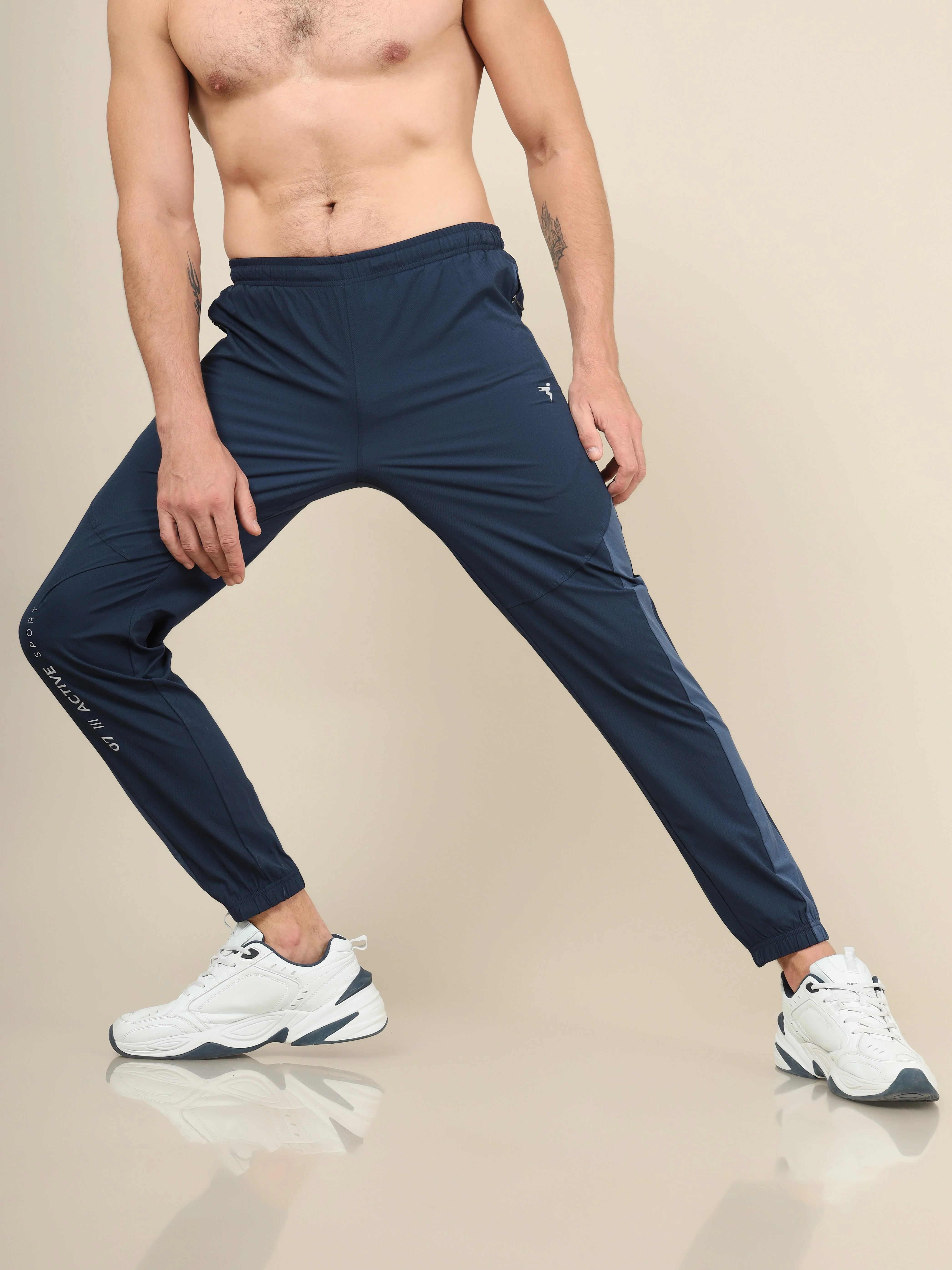 Men Solid Slim Fit Sports Joggers with TECHNOLITE - Image 2