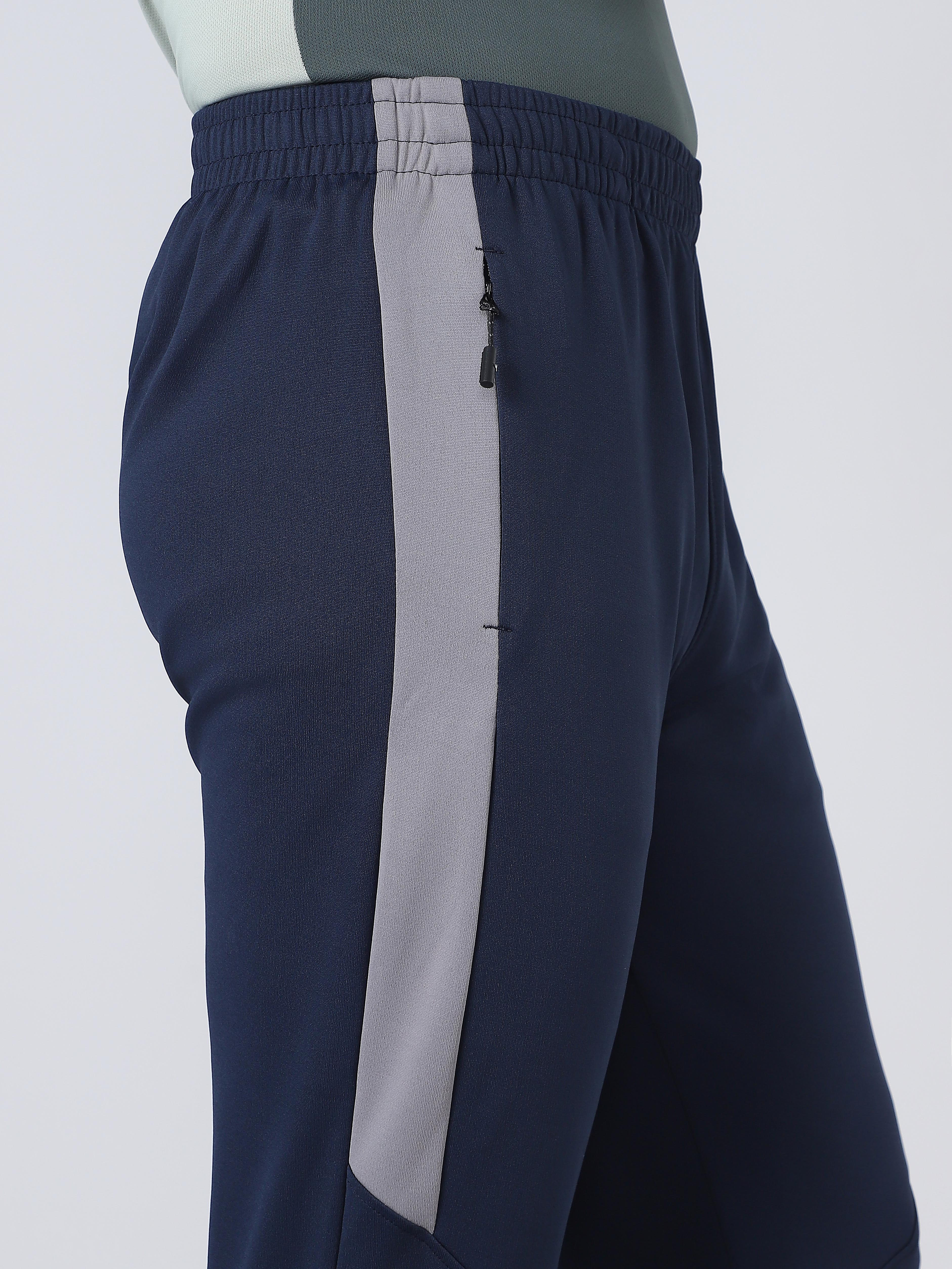 Men Solid Slim Fit Trackpants with TECHNO DRY - Image 9