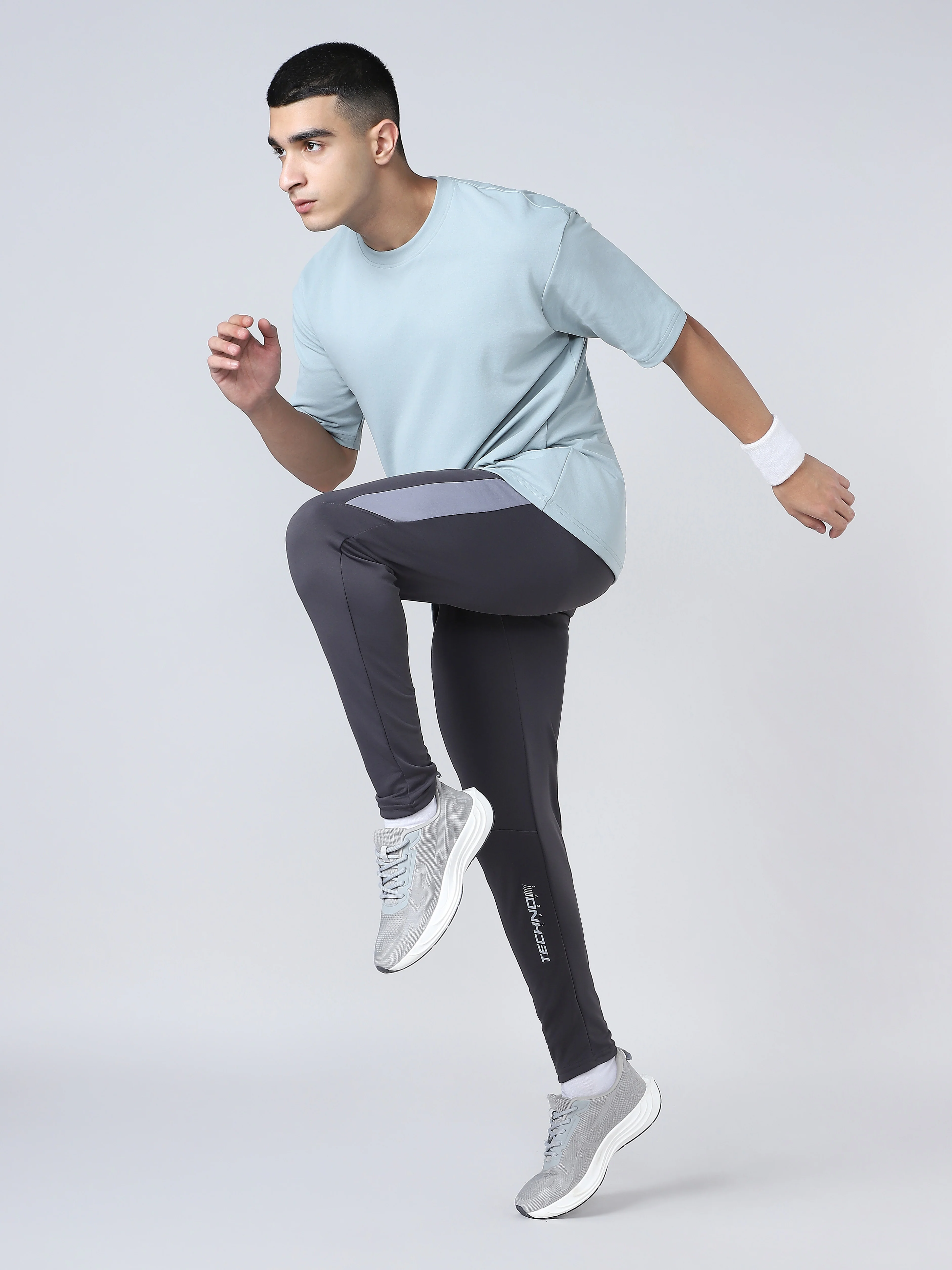 Men Solid Slim Fit Trackpants with TECHNO DRY - Image 4