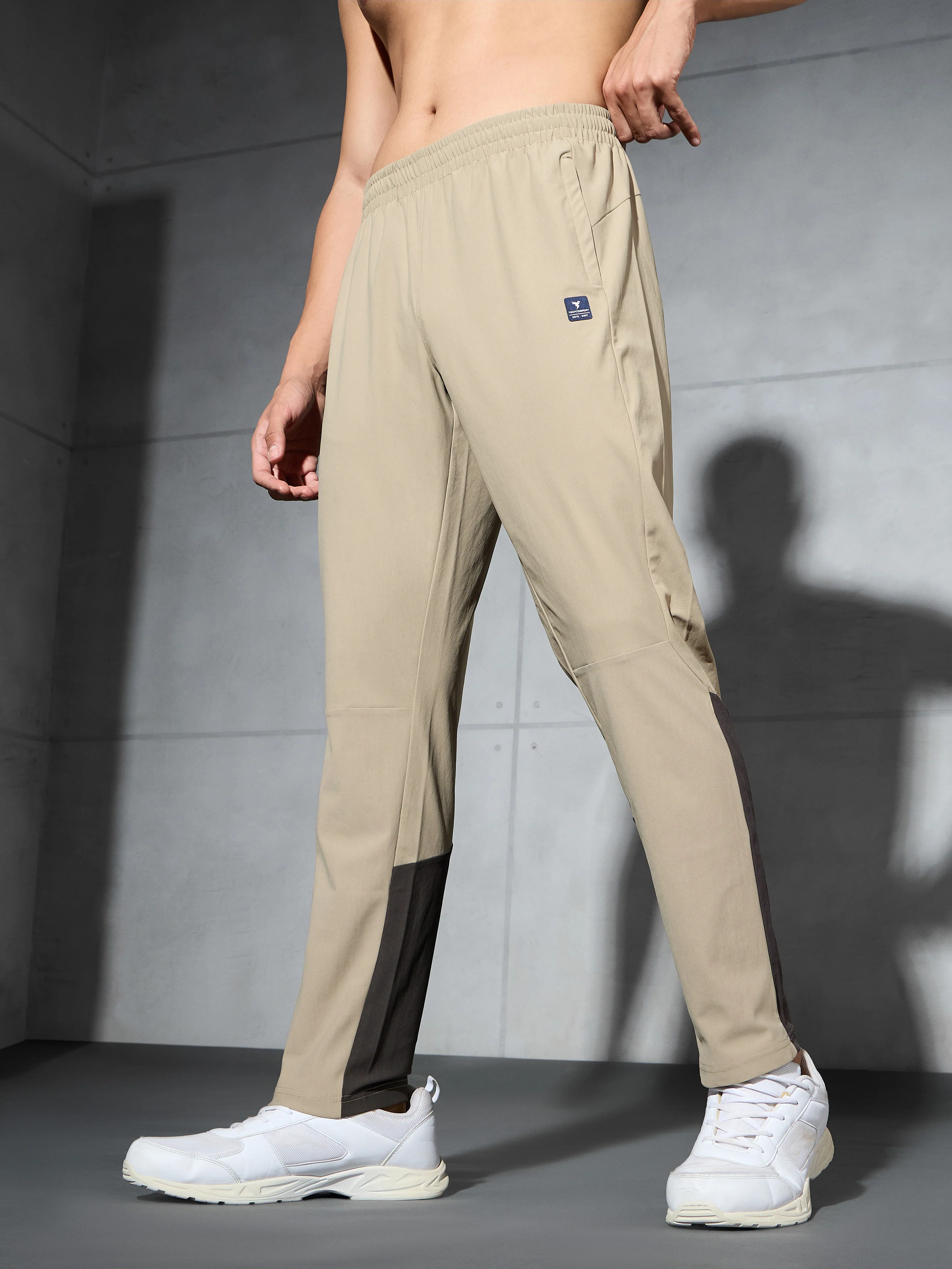 Men Solid Straight Fit Sports Trackpants with DURACOOL+ - Image 4