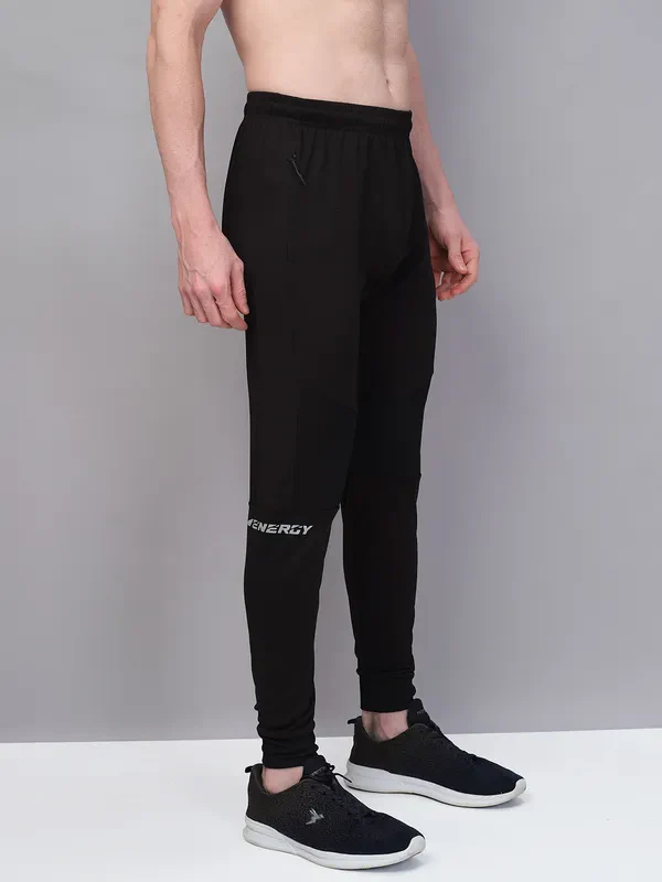 Men Solid Slim Fit Trackpants with TECHNO GUARD - Image 5