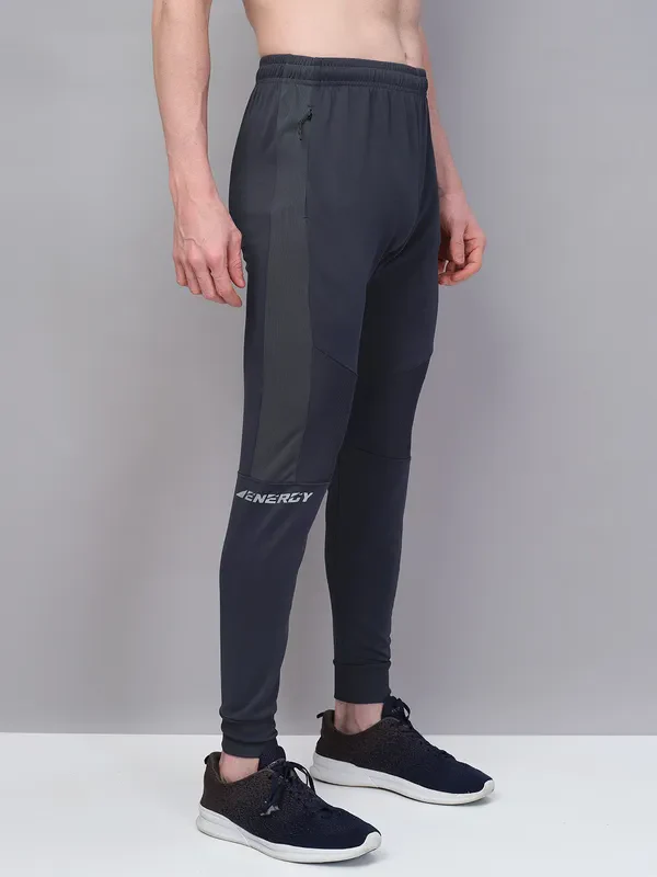 Men Solid Slim Fit Trackpants with TECHNO GUARD - Image 5