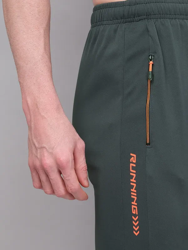 Men Solid Slim Fit Trackpants with TECHNO GUARD - Image 7