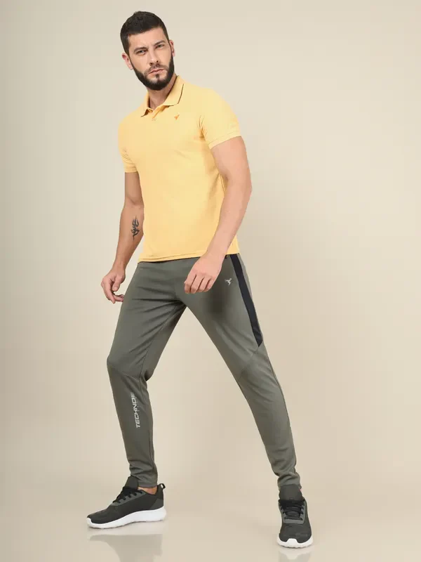 Men Solid Slim Fit Trackpants with TECHNO DRY - Image 6
