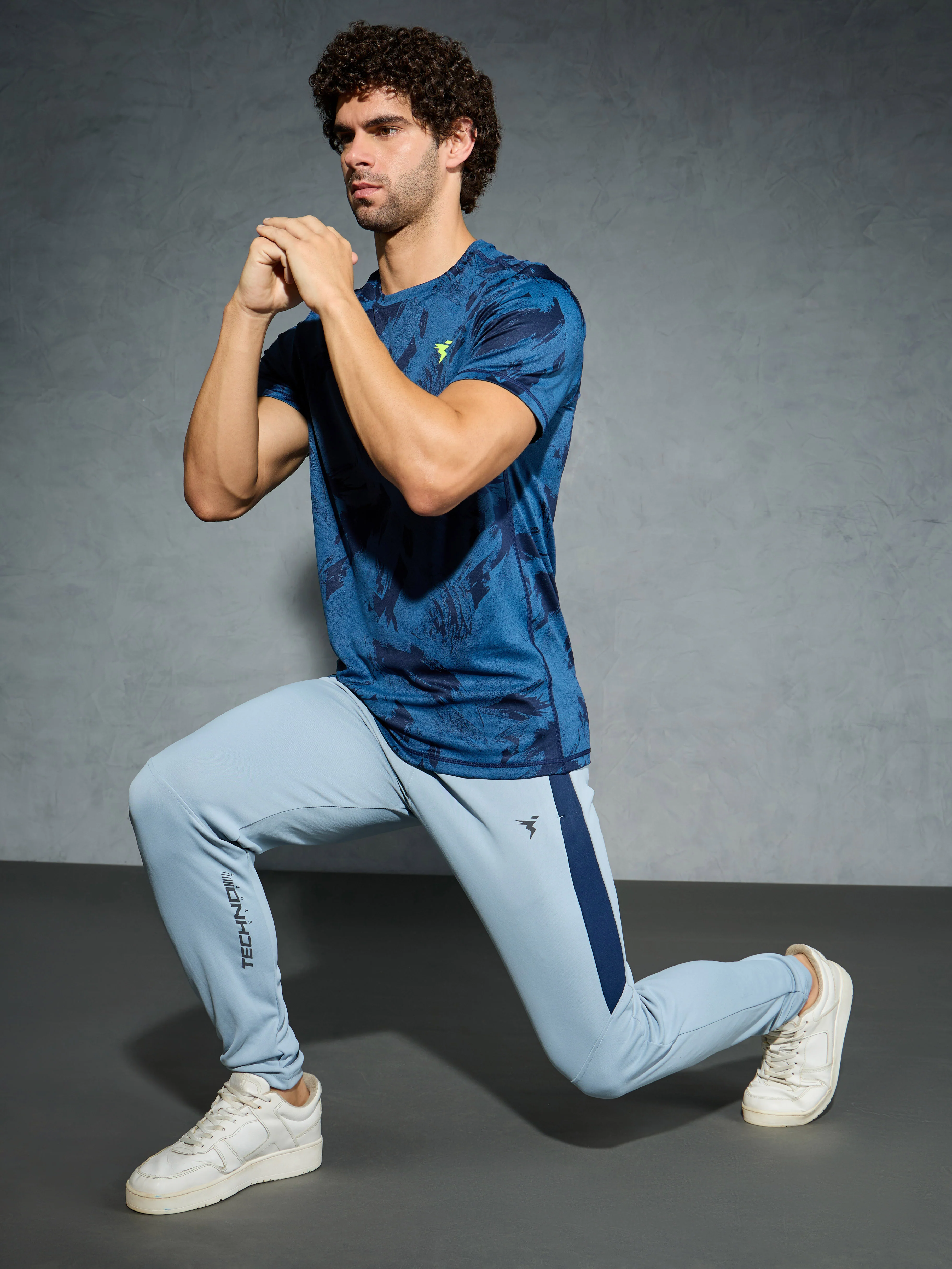 Men Solid Slim Fit Trackpants with TECHNO DRY - Image 5