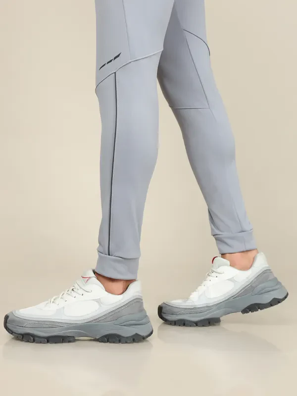 Men Solid Slim Fit Trackpants with TECHNO DRY - Image 6