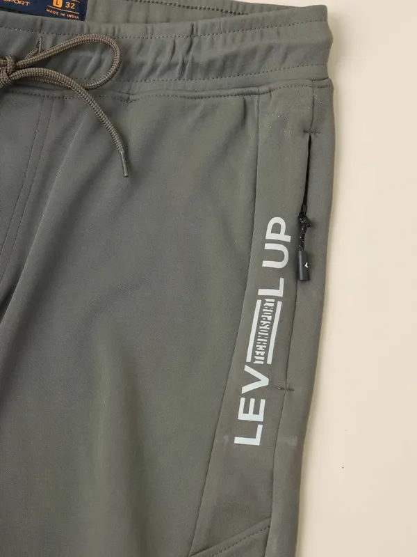 Men Solid Slim Fit Trackpants with TECHNO DRY - Image 8