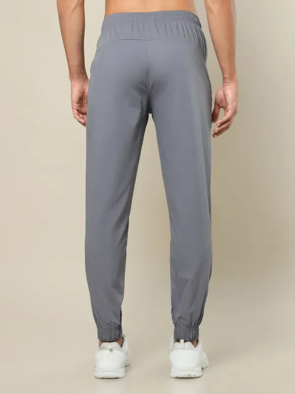 Men Solid Relax Fit Joggers with TECHNOLITE - Image 3