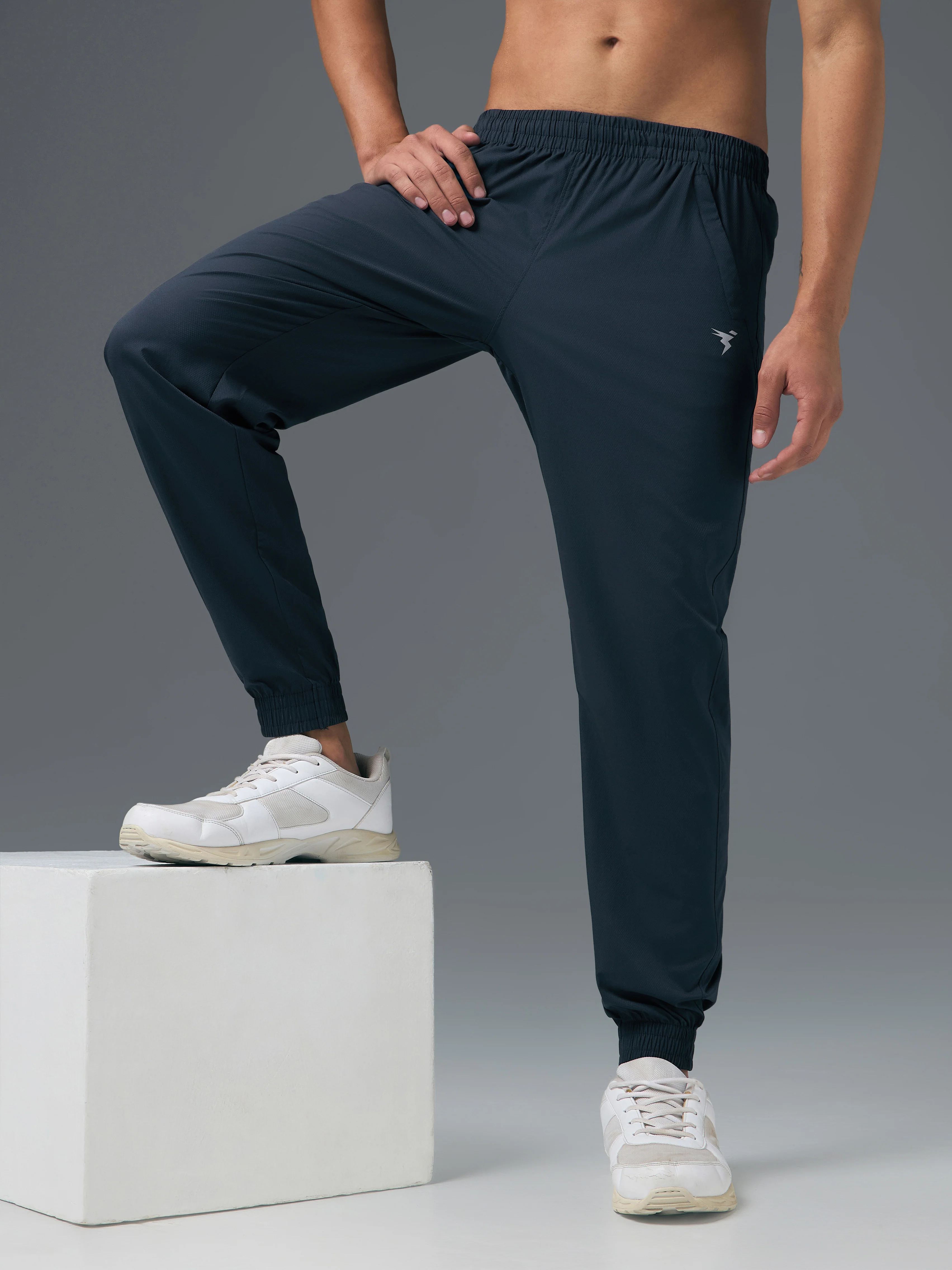 Men Solid Relax Fit Joggers with TECHNOLITE