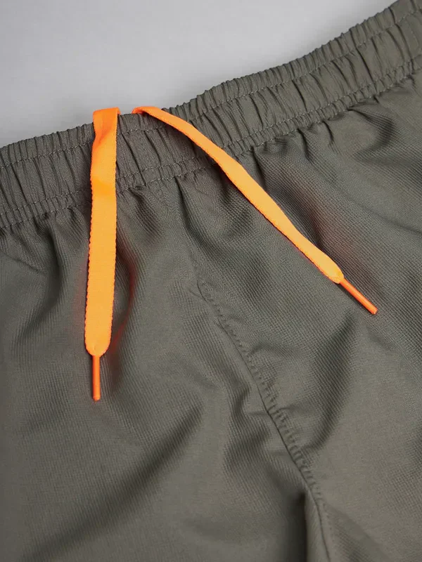 Men Solid Slim Fit Shorts with TECHNOLITE - Image 9