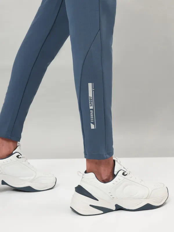 Men Solid Slim Fit Trackpants with ELASTO PLUS - Image 9