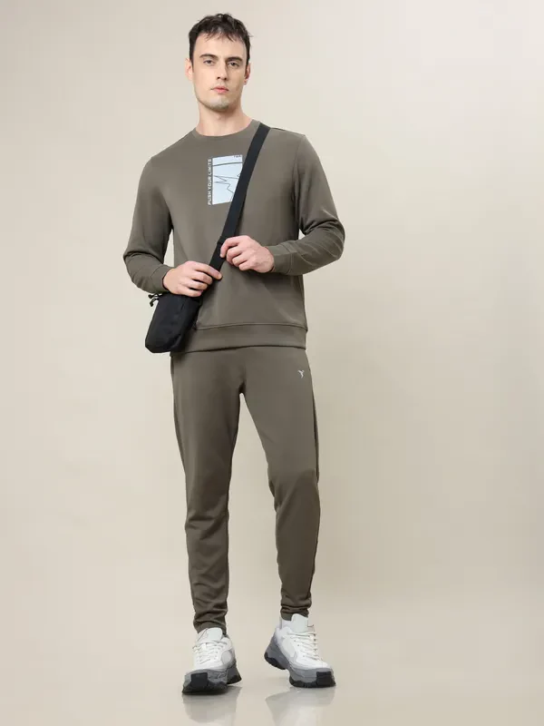 Men Solid Slim Fit Trackpants with ELASTO PLUS - Image 4